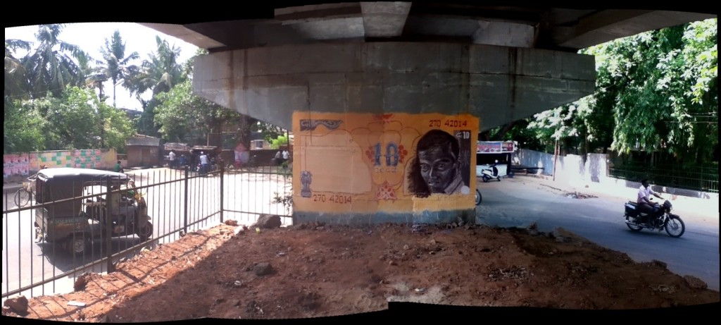a photograph of the ten-rupees mural with background